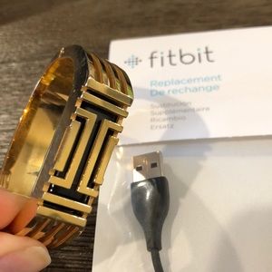 Tory Burch Fitbit bracelet and charger